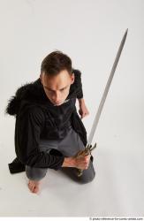 Claudio KNEELING POSE WITH SWORD